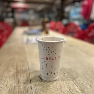 a cup of coffee on a table