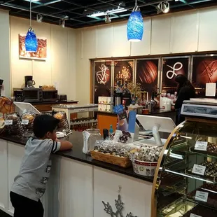 a boy at the counter