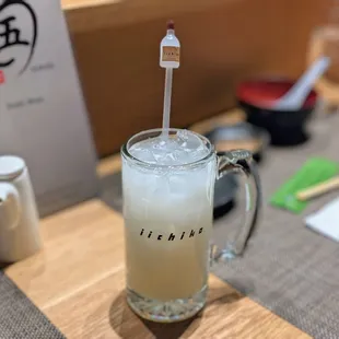a drink in a glass on a table
