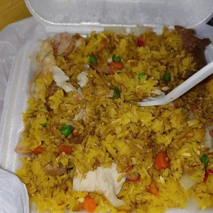 This is the grossest combo fried rice I've ever tasted for $10.. I'll never do back the beef is nasty... The rice is just yellow rice..