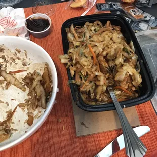 Muu shu chicken and steamed rice and it comes with five pancakes