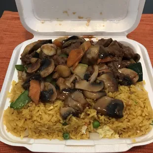 Beef with mushrooms and fried rice dinner special. Not in the photo is the eggrolls that came with it. This portion is so huge