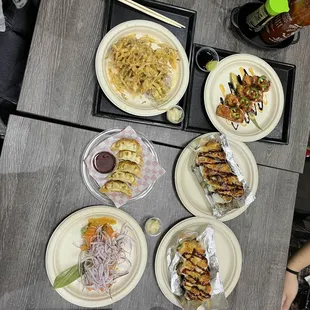 Crispy rice with spicy tuna, Dynamit roll, Baked Salmon Roll, Sunkissed Roll, Blooming Onion Roll, Gyoza