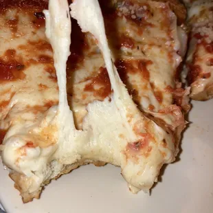 a slice of cheese pizza
