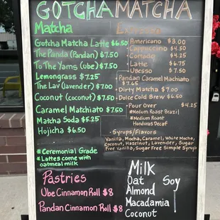 The colorful menu located outside the place!