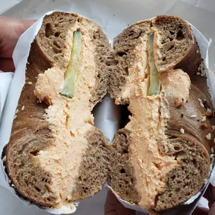 Whole wheat everything bagel with lox cream cheese and cucumber