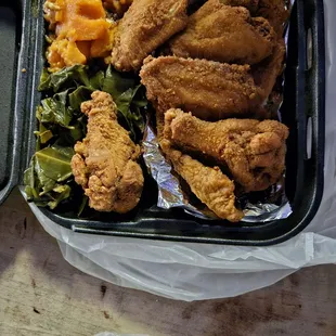 Yams,(cold,not to sweet), rice and gravy(cold) 6 fried wings (freshly cooked,under seasoned), 4 shrimp(freshly cooked,well seasoned)