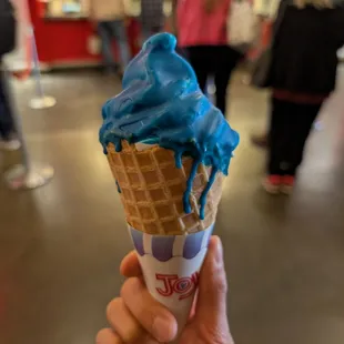 Berry topped Dior latte in a cone