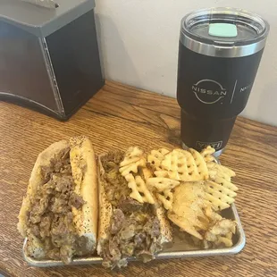 Prime beef cheesesteak &amp; waffle fries.