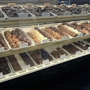 Display case with candy by the pound.  You can buy pieces by weight as well.