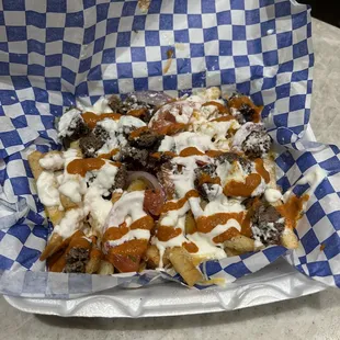 Beef Gourmandize Loaded Fries I really liked the fries!  It does have a spice factor, which is the orange sauce.