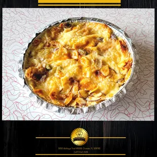 Om Ali refers to an Egyptian "bread pudding" traditionally made with pastry (or bread), pistachios, raisins, and coconut flakes.