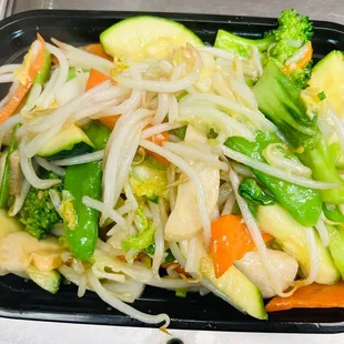 a salad in a plastic container