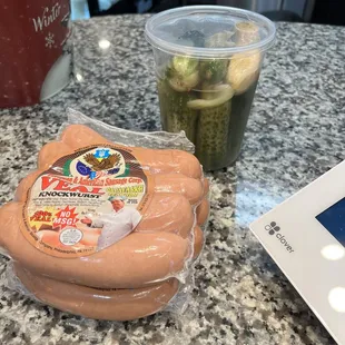 a hot dog and pickles