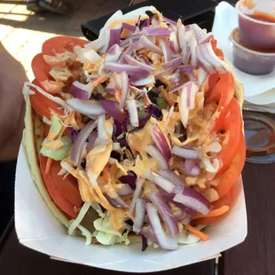 The döner sandwich with extra red onions. Didn't get a chance to try it but it looks so good, especially with that sauce.