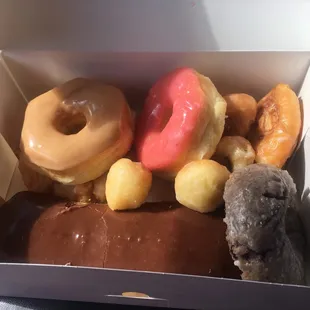 Dounut holes, chocolate bars, mini cinnamon rolls, maple covered, and strawberry covered! This is a box of success!