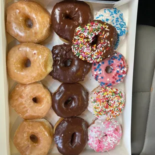 a variety of donuts in a box
