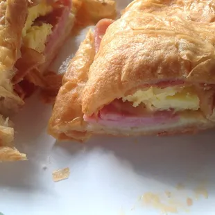 Bacon, ham, egg and cheese croissant