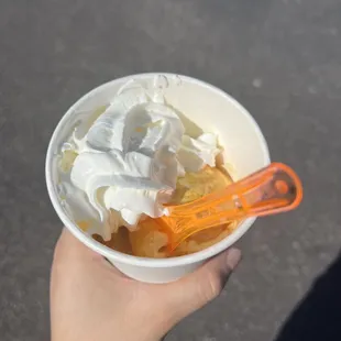 Crème brûlée affogato with whipped cream