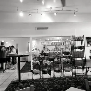 a black and white photo of a restaurant