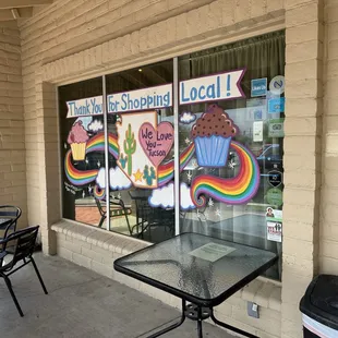 Front window with local artist's work