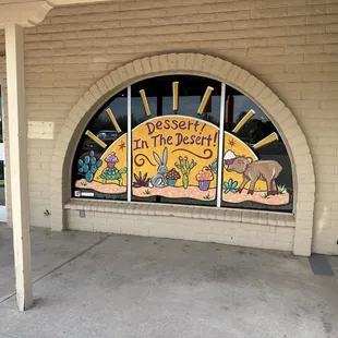 Front window with local artist's work!