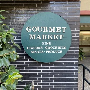 a sign on a brick building