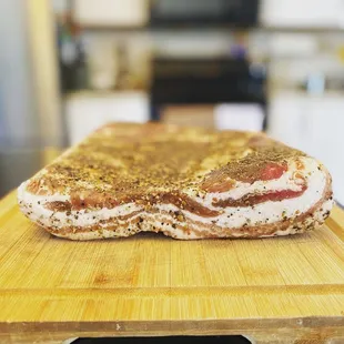 a piece of meat on a cutting board