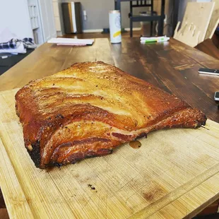 a piece of meat on a cutting board