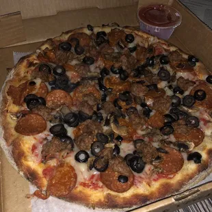 Vegan pepperoni, beyond crumble, mushrooms, and black olives