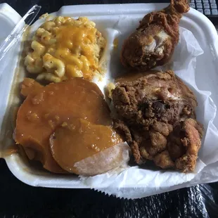 Fried chicken, yams, and Mac and cheese