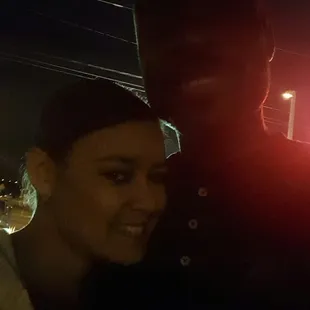 a man and a woman in the dark