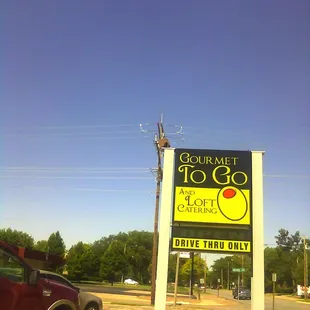 a sign for gourmet to go and loft