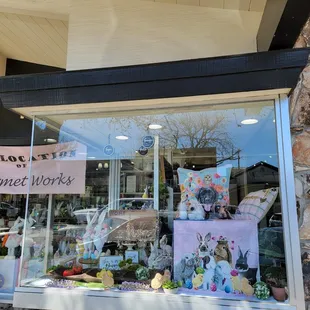 a window display of a gourmet shop