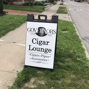 a sign for governors cigar lounge