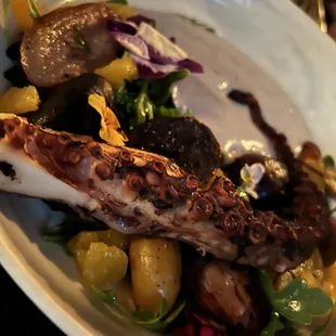 Braised octopus with purple potato foam