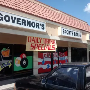 a car parked in front of it