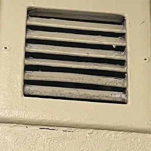 Dirty restroom vent cover
