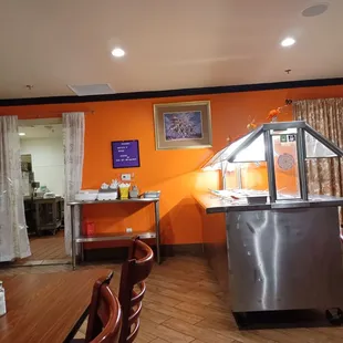 Looking across the dining room, towards the buffet