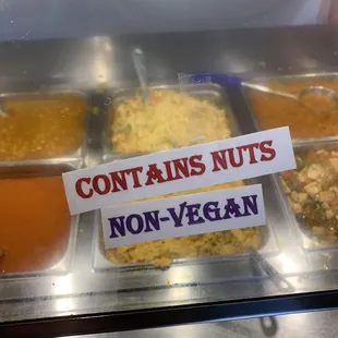 Signage show non-vegan item with nuts