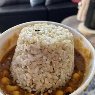 Part of the lunch special plate. Vegetable curry with brown rice. Those are black eyed peas- so tender!