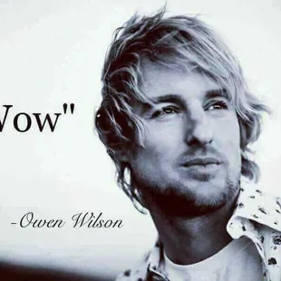 a black and white photo of a man with a beard