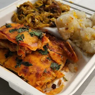 a meal in a styrofoam container
