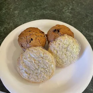 three muffins on a plate