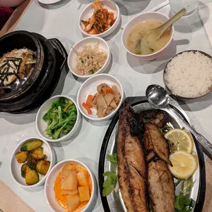 Grilled mackerel, banchan, stone pot bibimbap