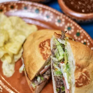 a sandwich and chips