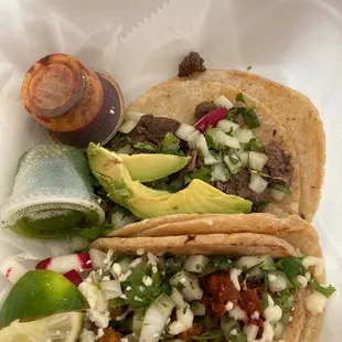 Tacos, one steak one pork