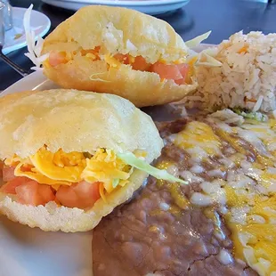 Potato, cabbage, cheese and tomato gorditas w/rice and beans