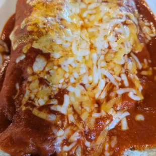 Chicken fajita enchilada w red sauce. Good hot red sauce.