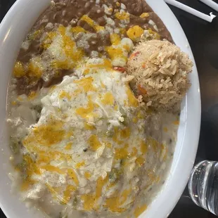 a bowl of beans, rice, and cheese